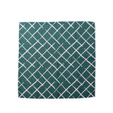 green dinner napkin featuring a trellis pattern from madcap cottage fabric.
