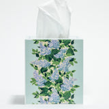 a blue floral tissue box cover with a repeating hydrangea pattern down the center of each side. 