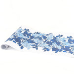 A blue and white floral paper table with blue hydrangea pattern on a white background
