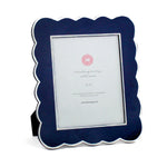 Blue 8 x 10 scalloped photo frame on a white background