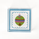 a medium blue square Acrylic Trays with Ornament motif on it on a white background
