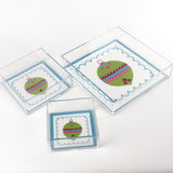 a blue square Acrylic Trays in different sizes with Ornament motifs on them on a white background