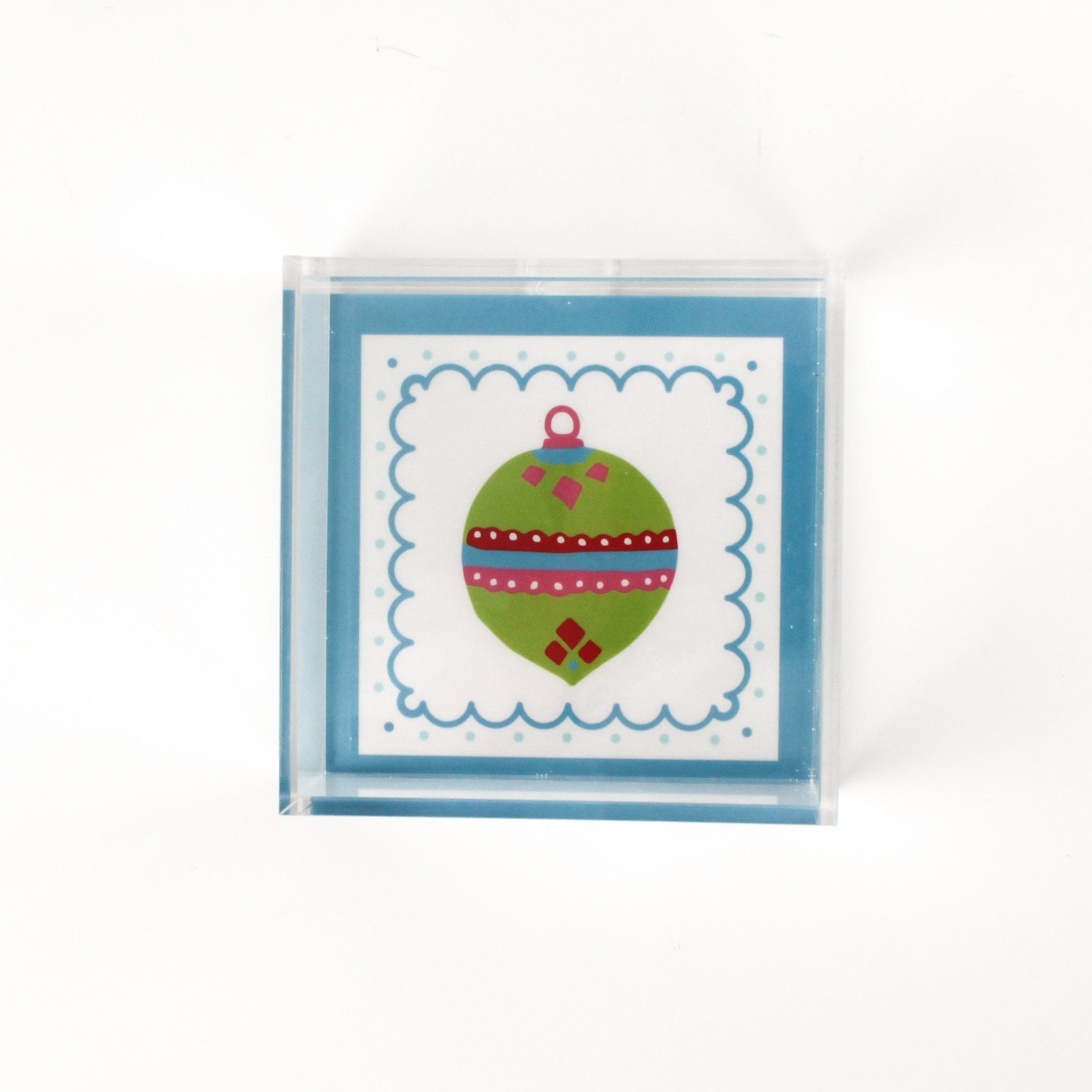 a small blue square Acrylic Trays with Ornament motif on it on a white background