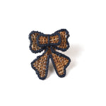 rattan bow napkin ring with a blue outline on a white background. 