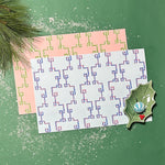 blue and pink bamboo lattice paper placemats on green background table setting