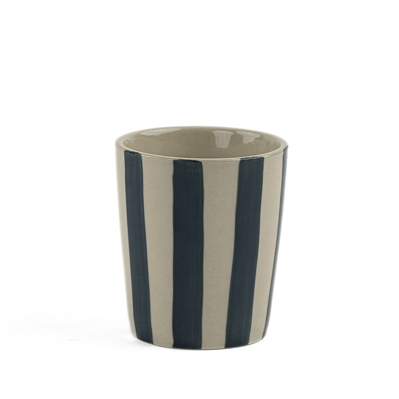 A blue striped ceramic cup in on a white background. 