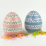 blue and pink harbor trail Easter eggs with decorative patterns and colorful filler