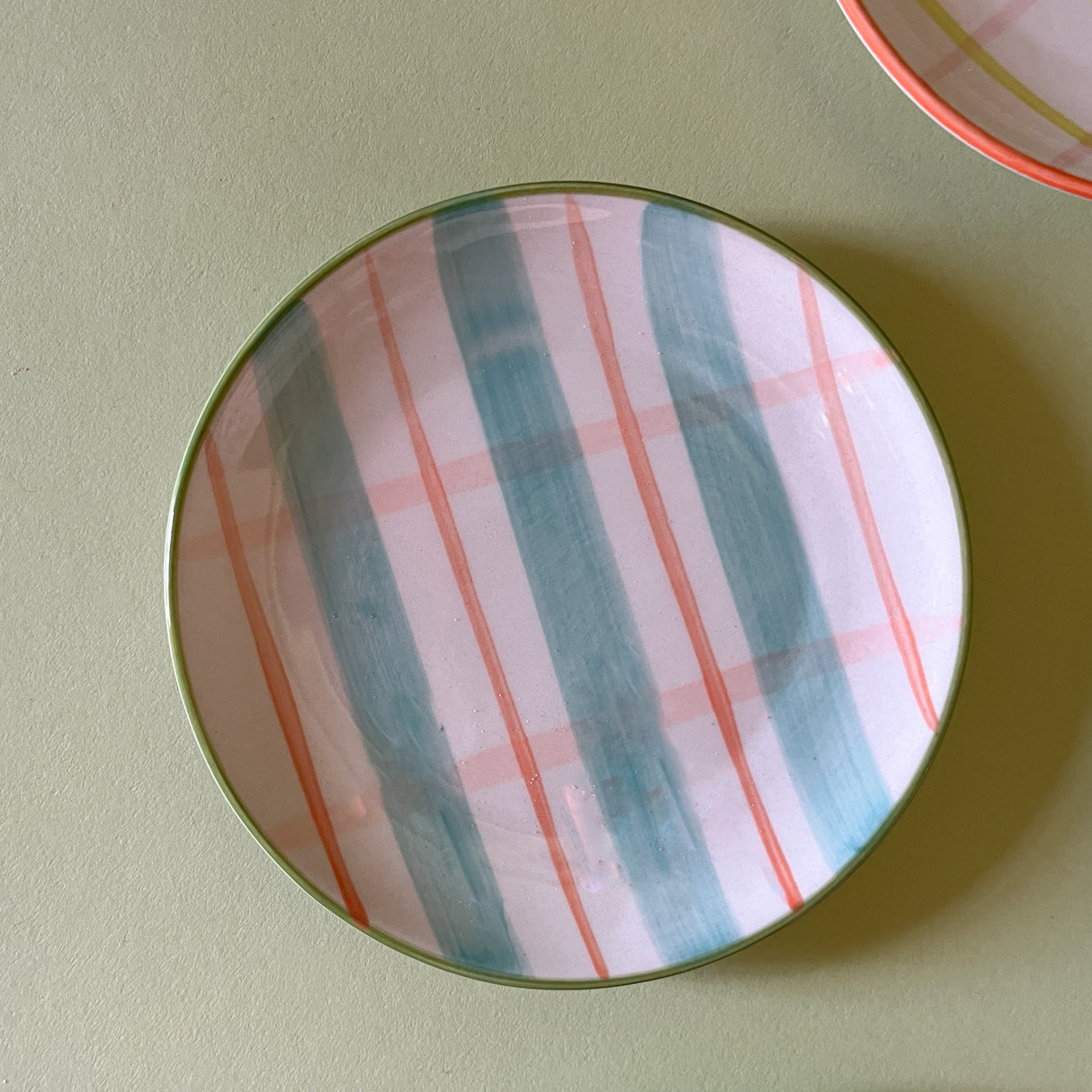 pink and blue plaid ceramic plate