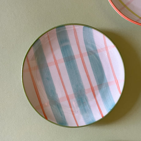 pink and blue plaid ceramic plate