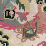 a close up of the boatman on an Old Peking pink and green rug with chinoiserie motifs from madcap cottage