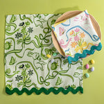 Bunnies and bow print cloth napkins in green and multicolor.