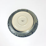 the underside of a glazed blue ceramic dinner plate from madcap cottage