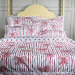 Bedding set with red bow pattern on a white background
