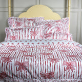 Bedding set with red bow pattern on a white background