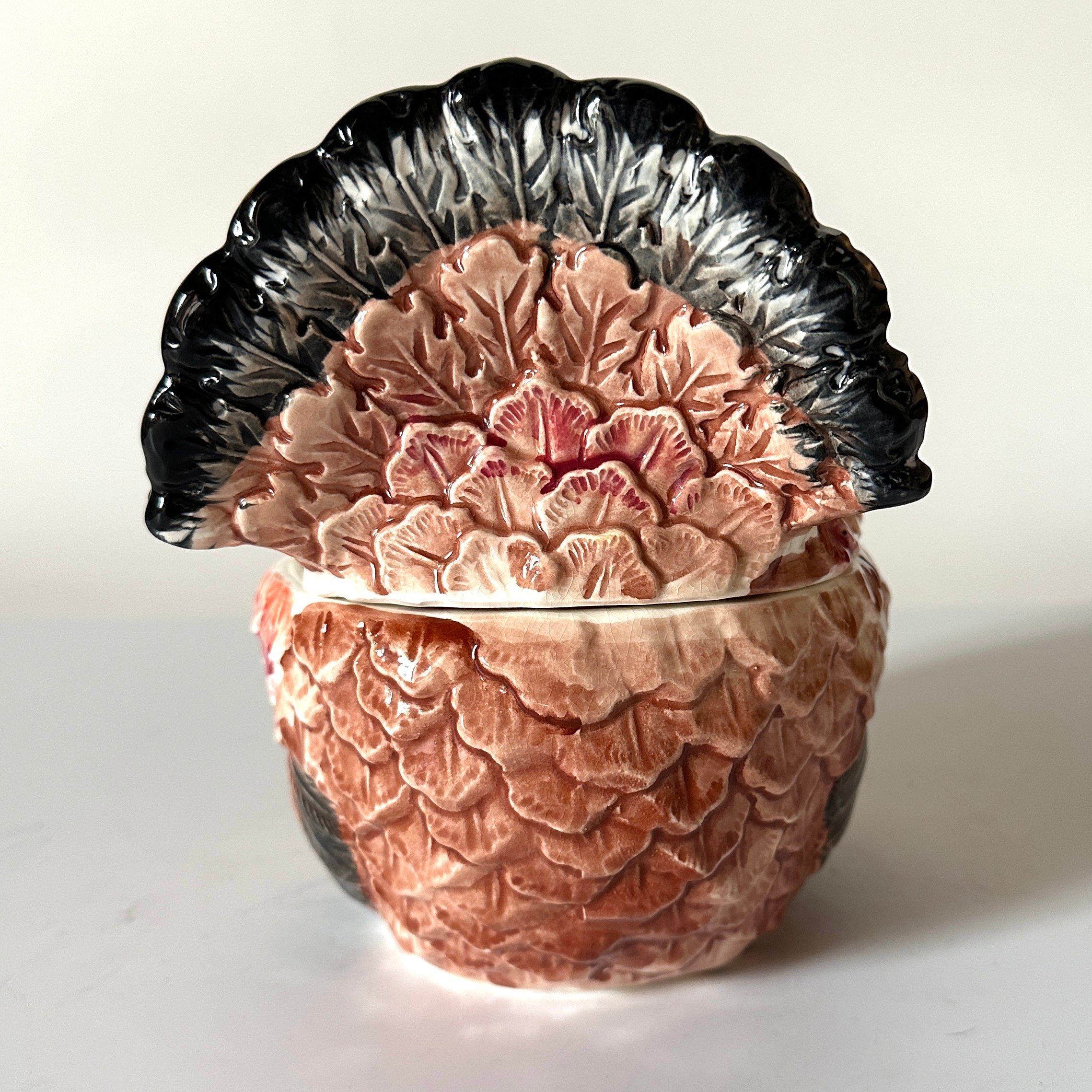 the tail of a ceramic-turkey-centerpiece