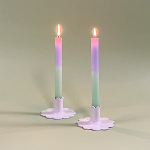 white ceramic candleholder with candles