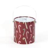 Dancing Candy Canes is a red acrylic Christmas ice bucket covered in a candy can motif fabric