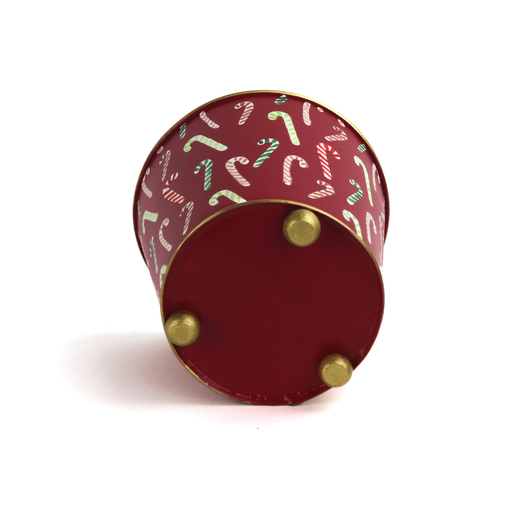 Bottom view of red tole cachepot with gold feet and gold-trimmed base.