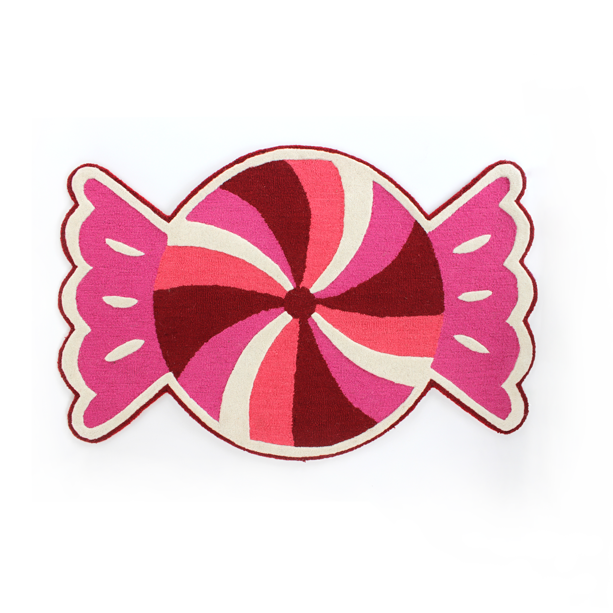 A Christmas rug in the shape of a wrapped red, white and pink candy. 