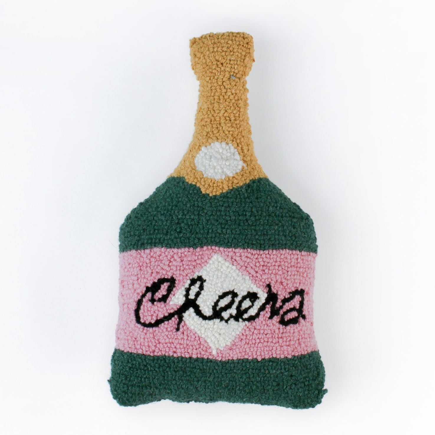 Bottle-shaped decorative pillow with a hooked texture, designed like a champagne bottle in green, pink, and gold colors, featuring the word “Cheers” on the label.