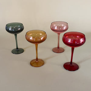 pink, green, red, gold champagne glasses