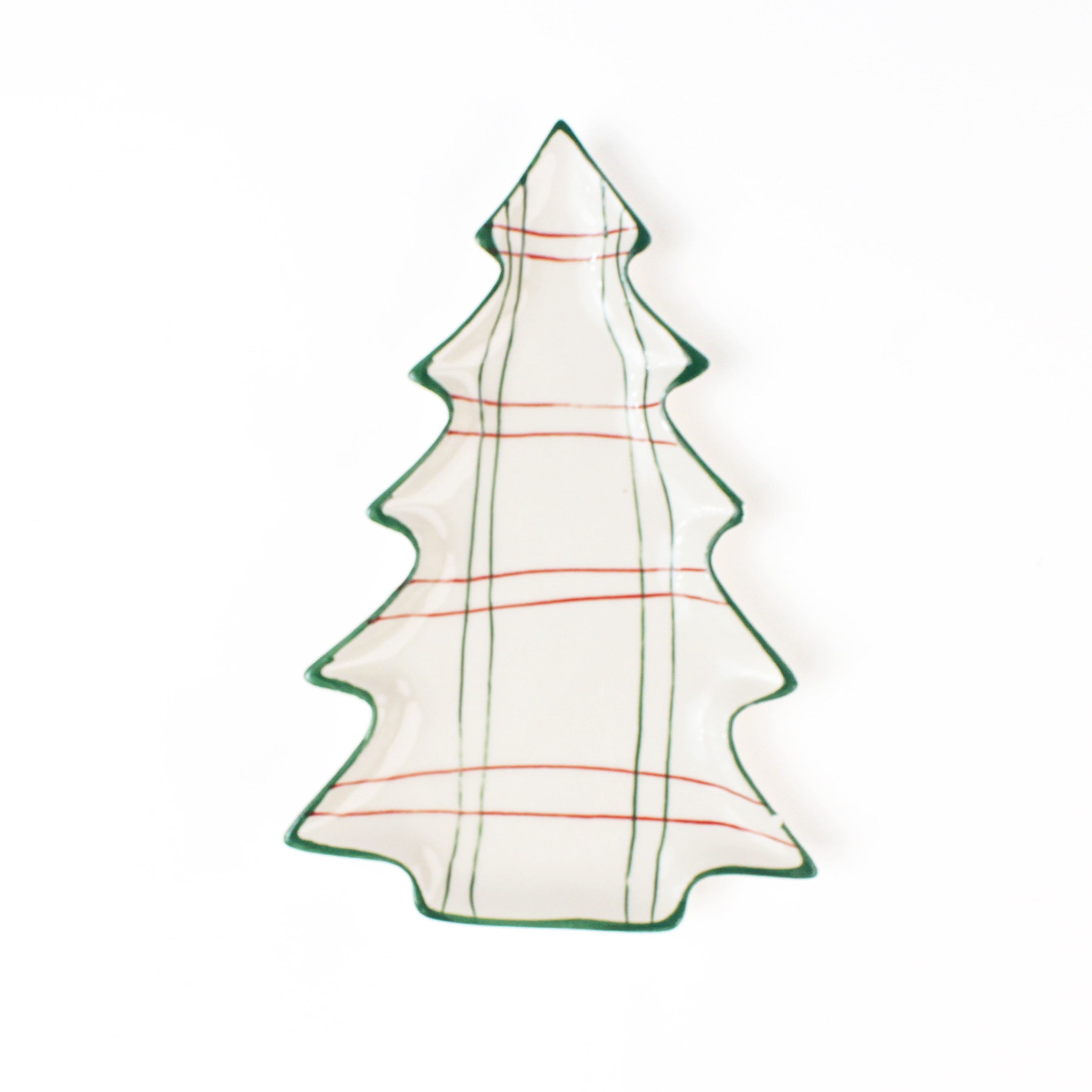 white christmas tree plate with red lines on a white background