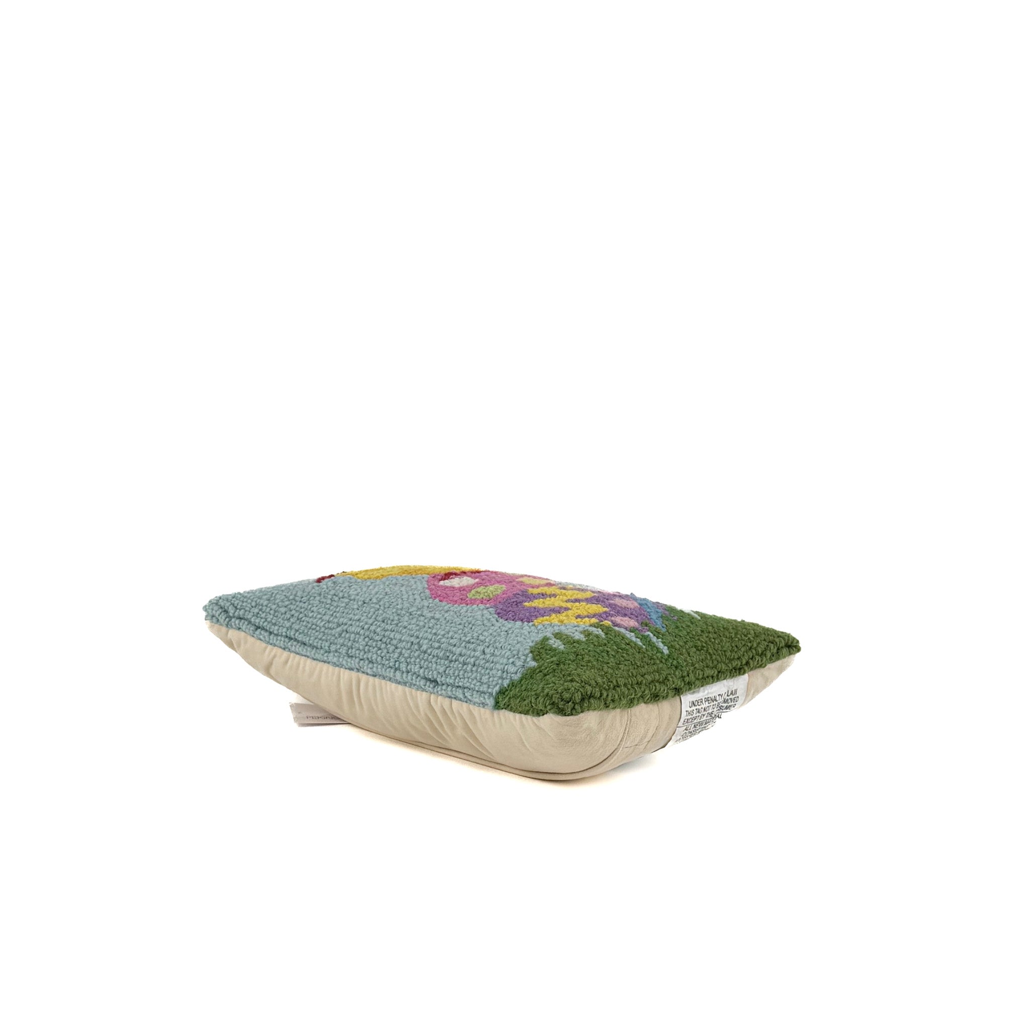 hooked pillow with chick sitting on colorful Easter eggs design