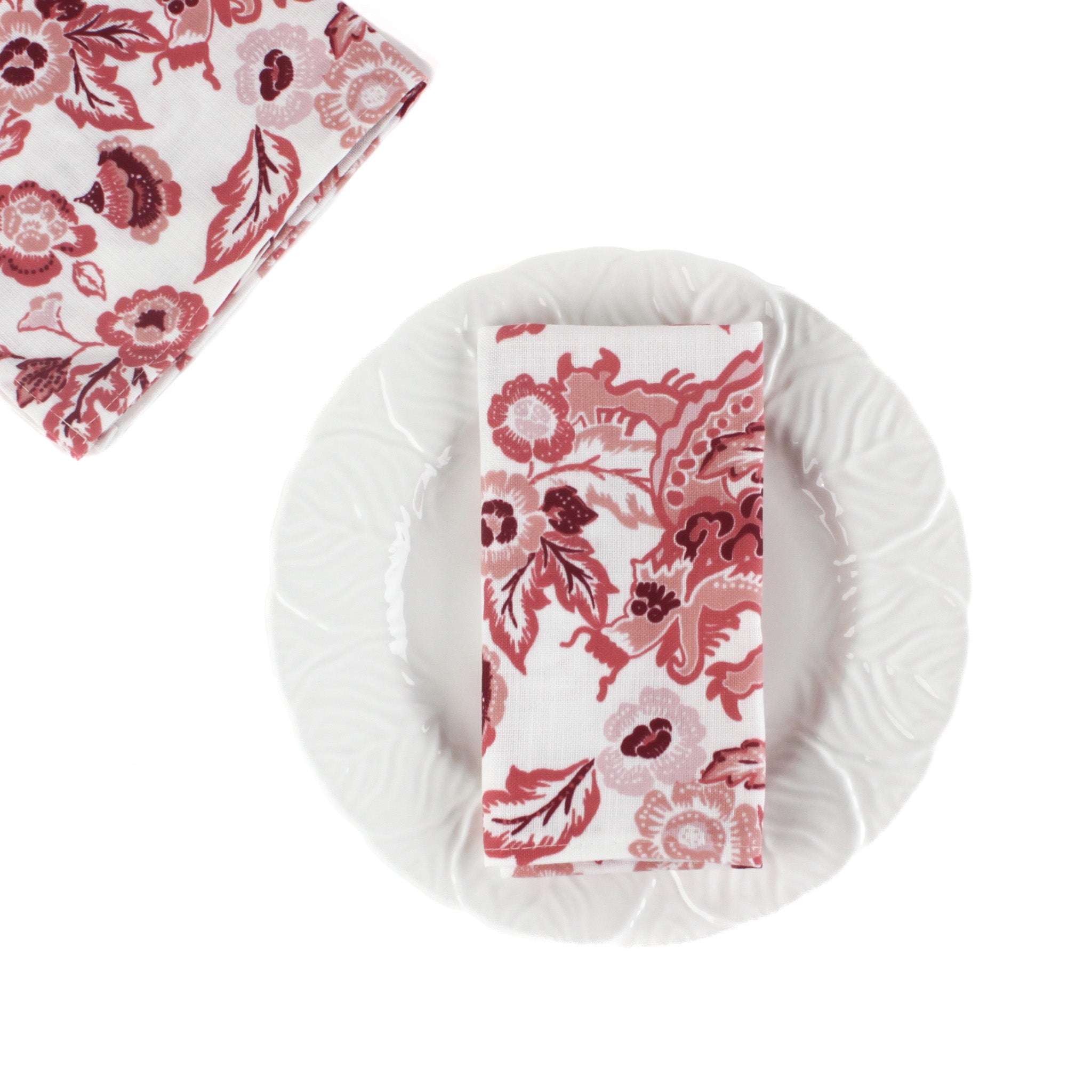 Red dragonl cloth napkin set with classic botanical pattern displayed on a white plate, elegant table linen ideal for Christmas tea towel styling, holiday entertaining, and seasonal home décor