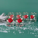 Christmas drinking glasses with red poinsettia and white flower design