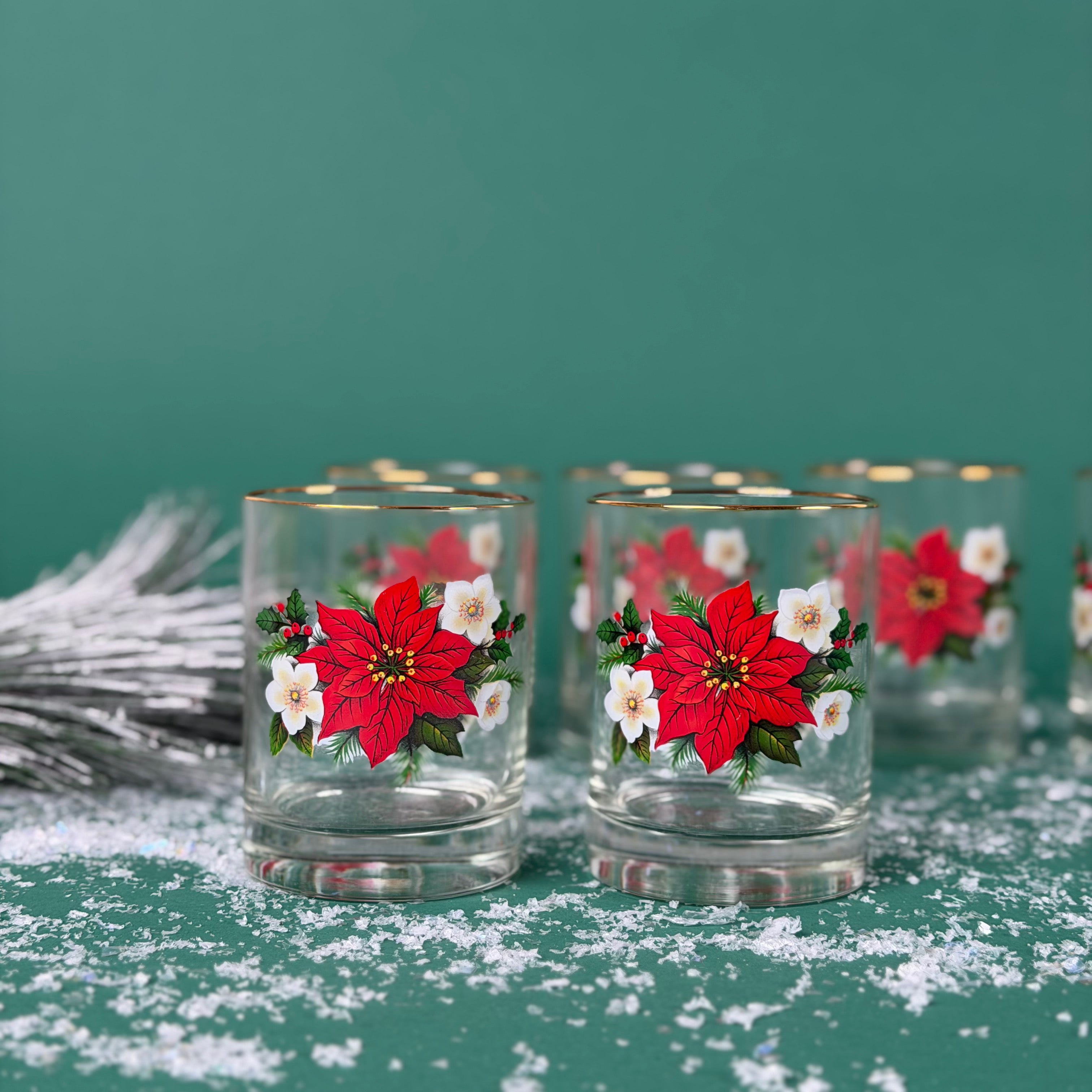 Christmas drinking glasses with red poinsettia and white flower design