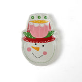 a colorful snowman ceramic christmas plates with a pink  hat on a white background