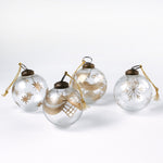 Set of 4 clear glass Christmas ornaments with elegant gold leaf and star designs, featuring gold hanging cords — perfect for adding a touch of luxury to holiday décor.