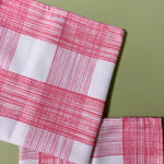 two pink gingham cloth dinner napkins in gin lane print fabric by madap cottage
