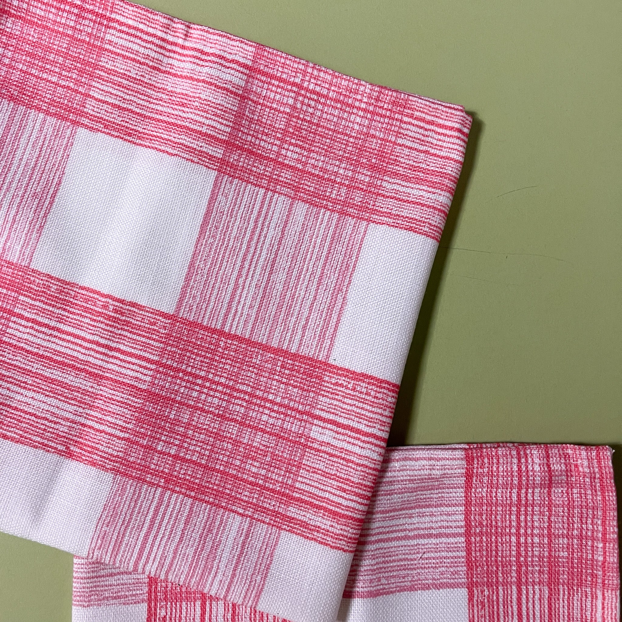 two pink gingham cloth dinner napkins in gin lane print fabric by madap cottage