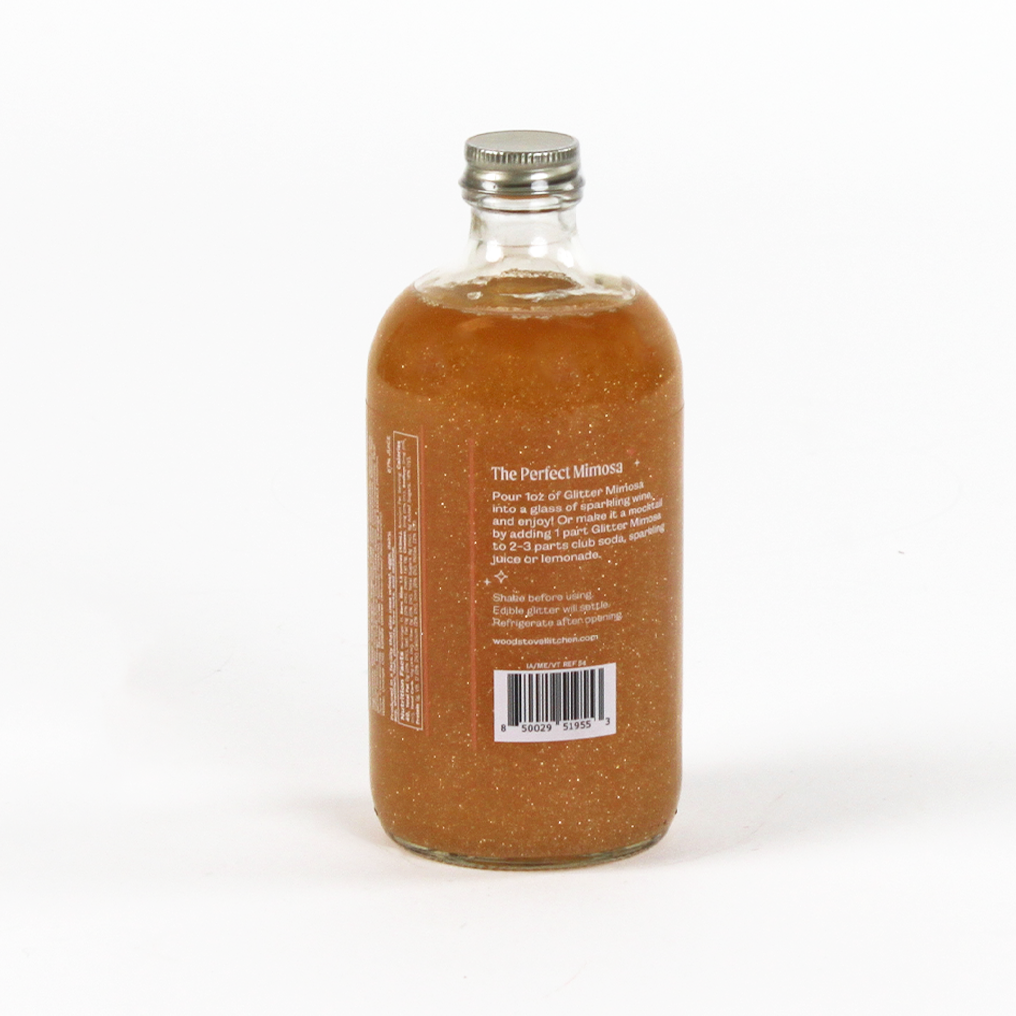 Bottle of 'The Perfect Mimosa' cocktail mix on a white background