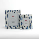 Two Blue Club house hand painted photo frames on a white background