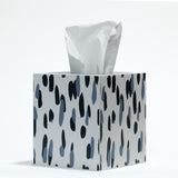 a blue and white tissue box cover patterned with a brushstroke motif called club house by madcap cottage