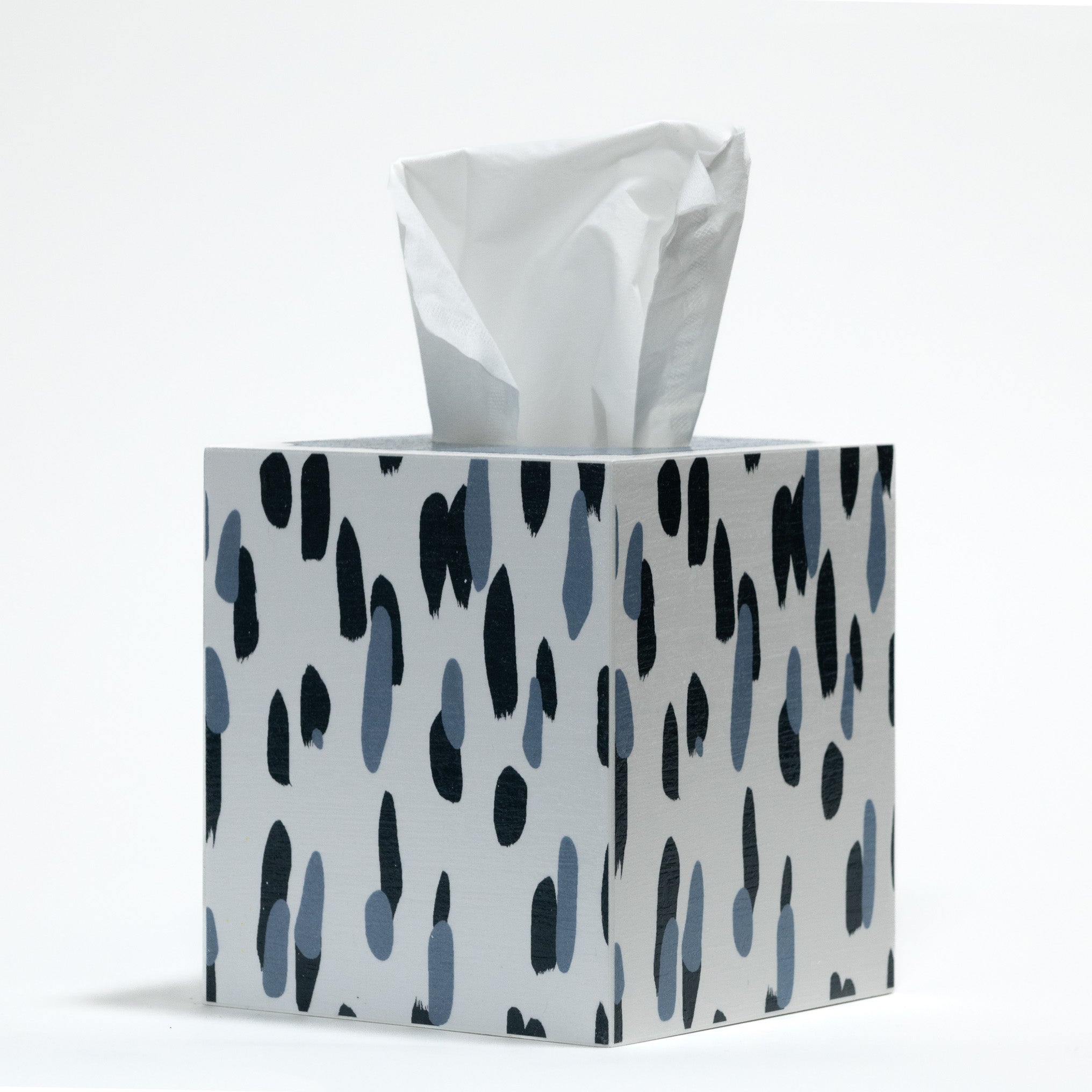 a blue and white tissue box cover patterned with a brushstroke motif called club house by madcap cottage
