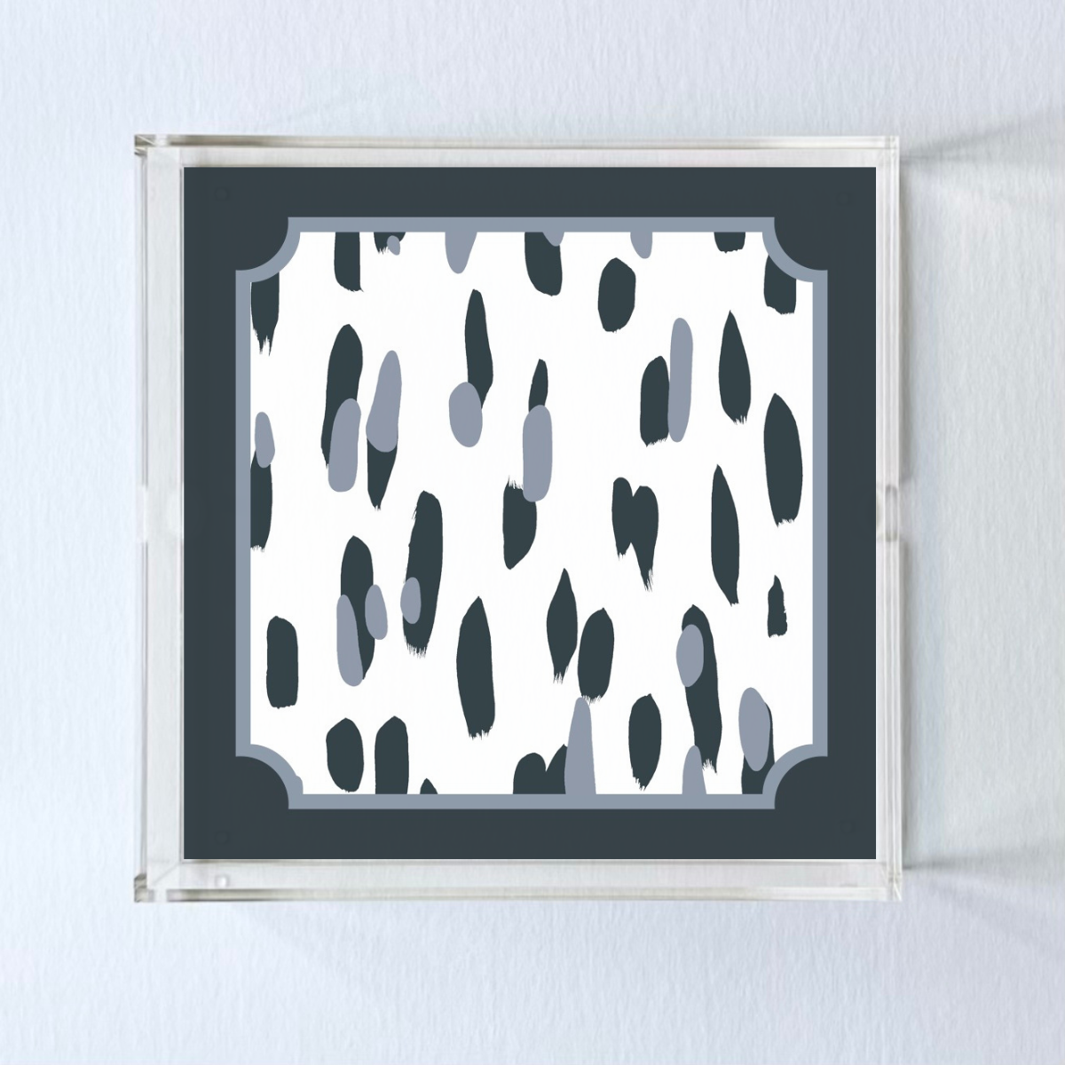 Top view of the Club House navy blue square acrylic tray on a white background