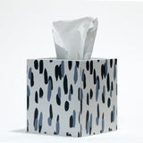 a blue and white tissue box cover patterned with a brushstroke motif called club house by madcap cottage