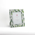 a 8' x 10' green Club house hand painted photo frame on a white background