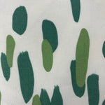 Close up Club House Brushstroke throw pillow with an abstract green brushstroke pattern on a white background.