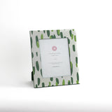 a 8' x 10' green Club house hand painted photo frame on a white background