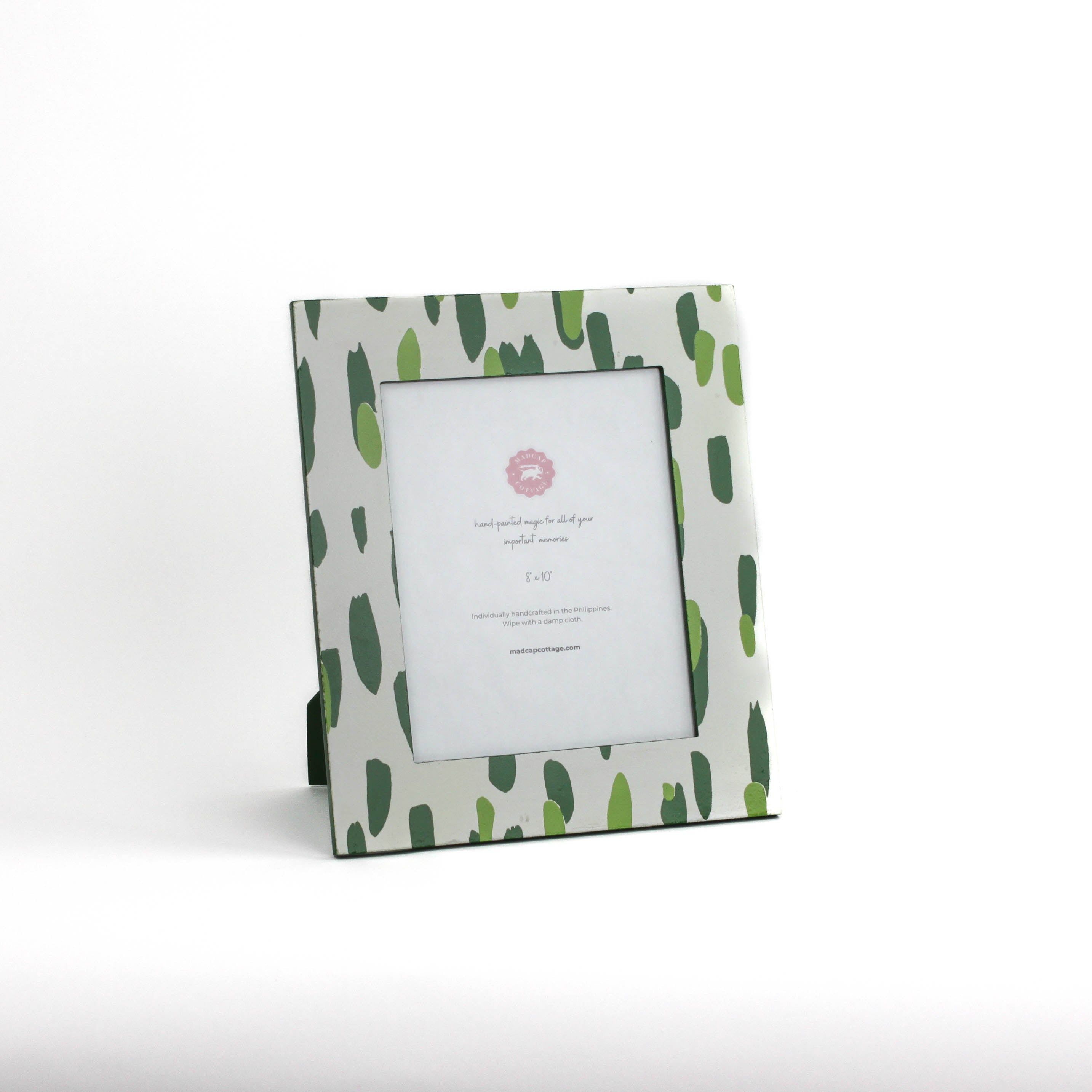 a 8' x 10' green Club house hand painted photo frame on a white background