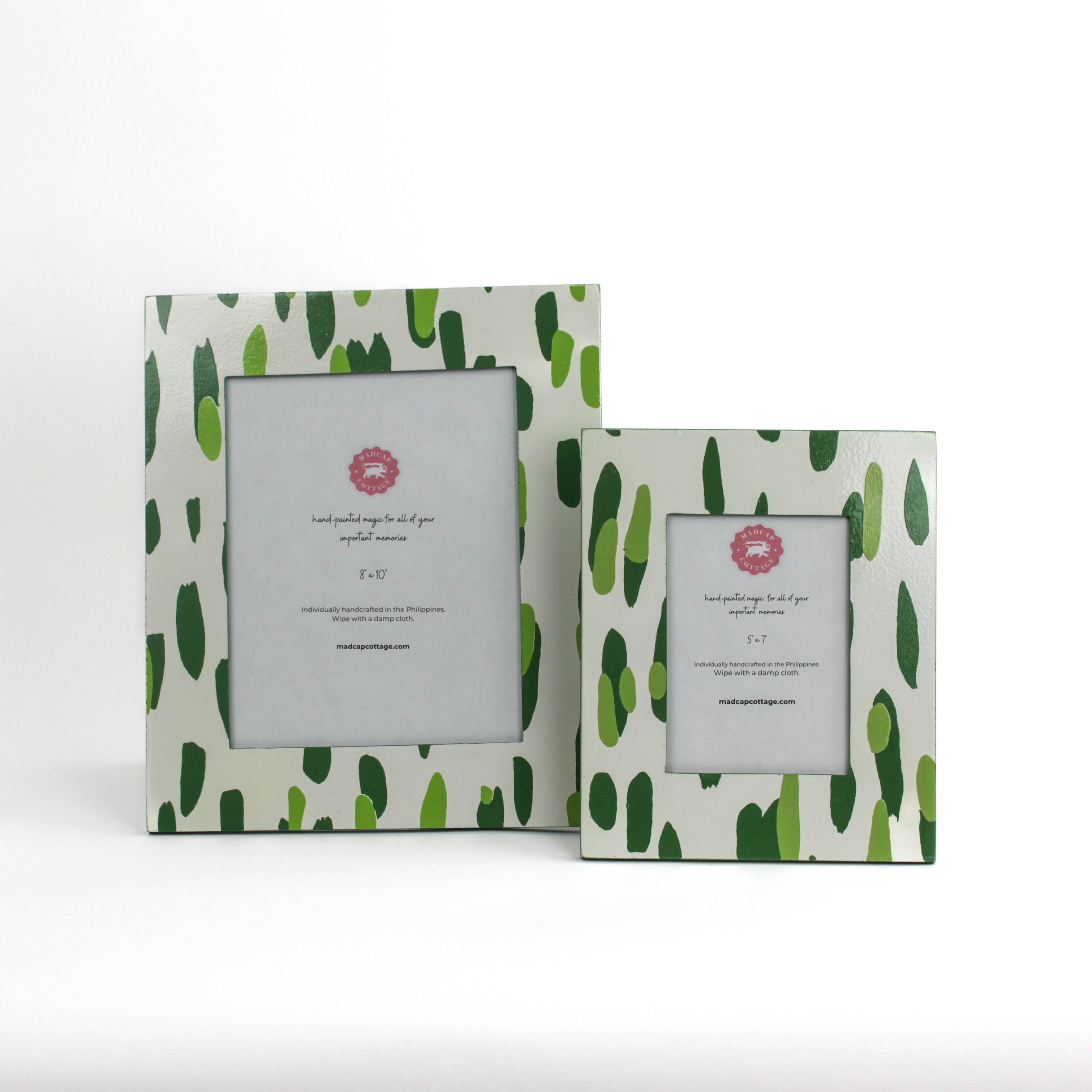 Two Green Club house hand painted photo frames on a white background