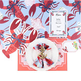 Coastal lobster table setting with lobster placemats, coral placemat, nautical napkin ring, menu card, and lobster place card.