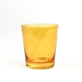 a colored drinking glasses in yellow  from madcap cottage
