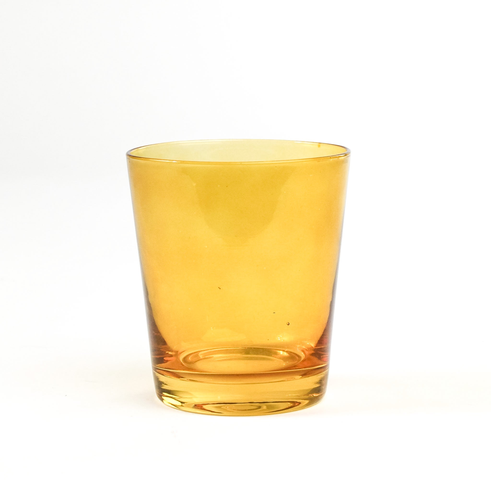 a colored drinking glasses in yellow  from madcap cottage