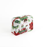 angle view of a large Cottage Grove Geranium, a floral toiletries bag with a red, green, and white color scheme, featuring a geranium design.