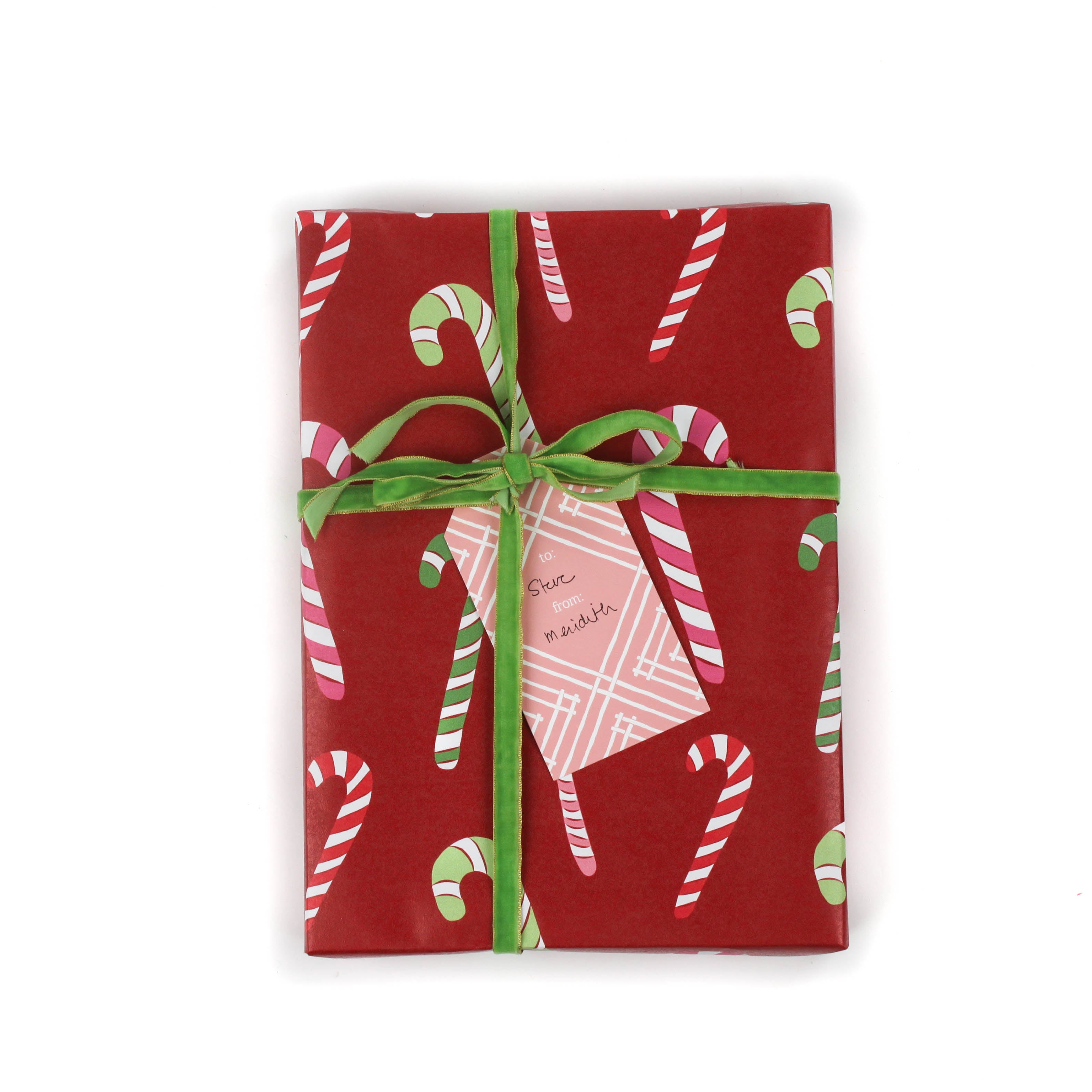 colorful christmas wrapping paper with colored candy cane motifs